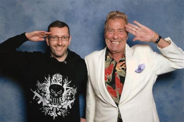 How tall is John Levene